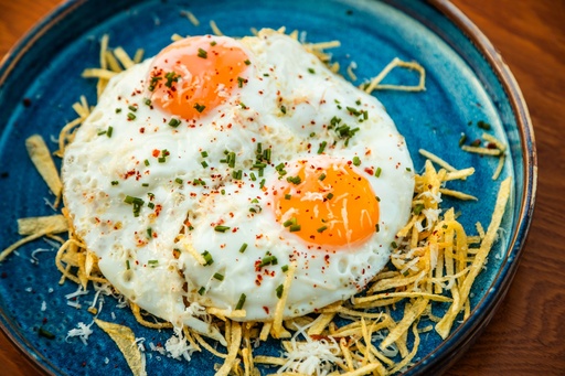 Fried Eggs with Kasseri Shavings